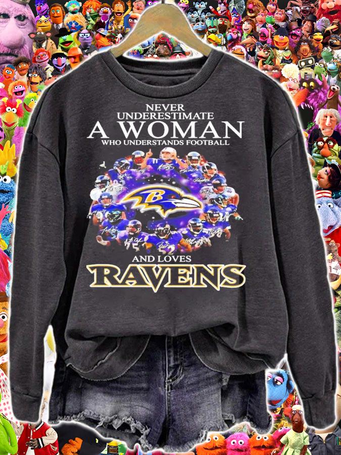 Never underestimate a woman and love Baltimore Ravens signatures shirt sweatshirt